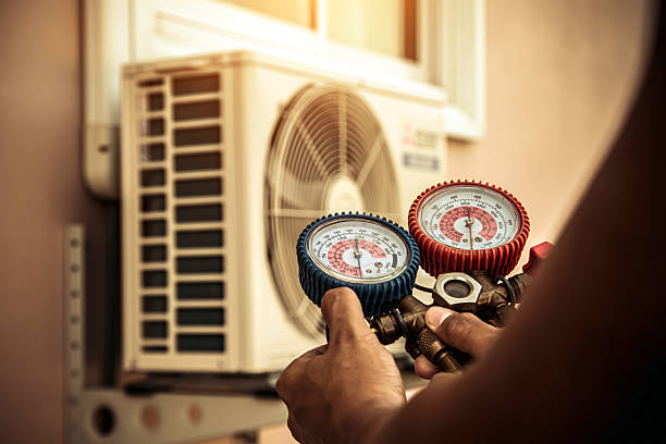Professional Hvac technician working in Westborough, MA